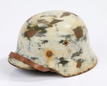 Second World War German M35 steel helmet, inside rim marked 'ET61' for the maker Eisenhuttenwerke,