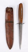 Second World War variant Fairbairn Sykes Fighting Knife, steel blade, broad oval shaped wooden