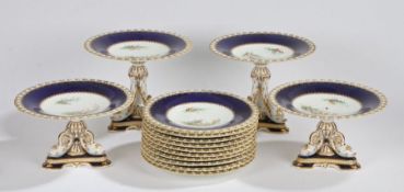 19th Century porcelain dessert service, with hand painted folate and leave spandrels with gilt and