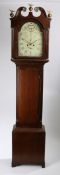 Late George III oak eight day longcase clock, the hood with scrolled pediment surmounted by three