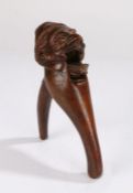 19th Century treen nutcracker, carved as a bearded man with a pointed hat, 20cm high