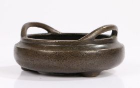 Chinese bronze censer, with [pierced arched handles, raised on three squat feet, six character marks