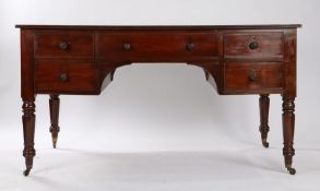 William IV mahogany library table, the leather inset top above frieze drawers and dummy drawers with