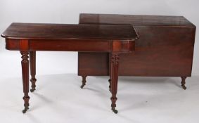 George III mahogany drop leaf dining table, in the manner of Gilows, the rectangular drop leaf top