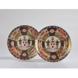 A Good pair Chamberlains Worcester Porcelain armorial plates, circa 1810/1820, the shield centre