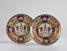 A Good pair Chamberlains Worcester Porcelain armorial plates, circa 1810/1820, the shield centre