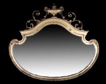 Victorian gilt wall mirror, the urn and scroll pediment above the shaped mirror plate, 105cm wide,