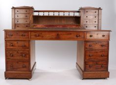 Victorian mahogany twin pedestal desk, the leather inset top surmounted by a series of small drawers