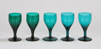 Matched set of five 19th Century English green glass wine glasses, with a tapering bowl above a stem