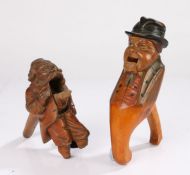 19th Century nut cracker, the nut cracker carved as a moustached gentleman with a long coat, AF,