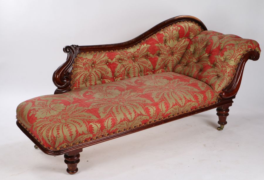 Victorian mahogany chaise lounge, the arched top rail above a button back and stuff over seat raised