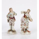 Pair of German Triebner Ens & Co porcelain figures, a gentleman and lady with confirming foliate