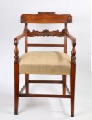 Regency mahogany elbow chair, the gadroon and shell carved cresting rail above a shell and scroll