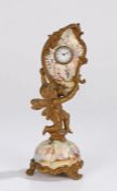 An Austrian / Vienna desk clock, the enamel dial being held by a gilt putto in a pictorial panel