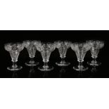 Set of six 19th Century glasses, the pan tops engraved with grapes and leaves above a facetted