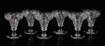 Set of six 19th Century glasses, the pan tops engraved with grapes and leaves above a facetted