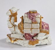 Majolica pottery model of a reclining camel, the saddle bags with a vase section and lifts off to