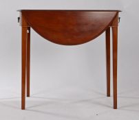 Regency mahogany pembroke table, the drop leaf oval top above a frieze drawer and opposing dummy