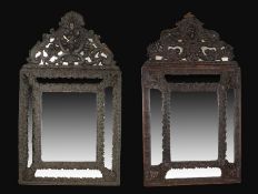 Near pair of Dutch wall mirrors, each with decorative copper surrounds and five mirror plates,