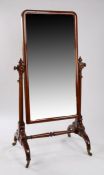 Victorian mahogany cheval mirror, the arched mirror plate held between acorn capped turned columns