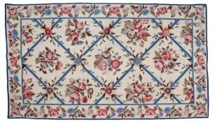 Decorative woolwork wall hanging, with an Aubusson style of flower sprigs and blue shaded borders,