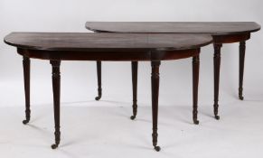 Pair of Regency mahogany demi lune side table, in the manner of Gillows, the shaped top with