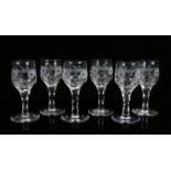 Set of six 19th Century wine glasses, the bowl engraved with a bird in flight and flowering foliage,