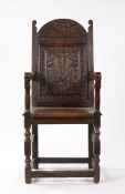 Late 17th Century English oak Wainscot chair, the arched top with a two carved aquatic beasts