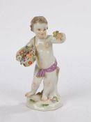 Meissen porcelain figure, of a standing boy holding a basket of flowers, a tree trunk behind and