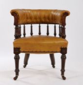 Victorian tan leather desk chair, the curved button back above spindle turned supports and over-