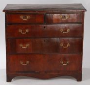 Regency mahogany chest of drawers, the rectangular top above two short and three long graduated