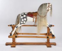 19th/20th Century rocking horse, with a grey horse hair mane on a white and grey body with a studded