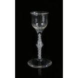 18th Century air twist wine glass, third quarter of the 18th Century, supported on centrally knopped