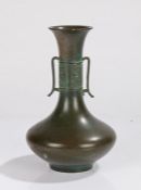 19th Century Chinese bronze vase, the flared neck with pierced handles and central scroll cast