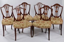Set of six mahogany and boxwood inlaid dining chairs, in the Sheraton manner, with an arched top