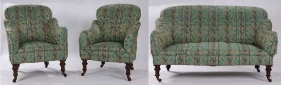 Victorian mahogany suite, to include two bow back tub armchairs raised on turned mahogany feet and