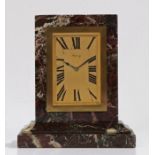 Asprey, an Art deco desk timepiece, the variegated marble case housing a gilt Asprey signed dial