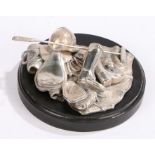 Polo themed desk ornament, depicting mallet, ball, helmet and saddle, indistinctly signed, dated