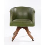 Author Lawrence Meynell's desk chair, the green leather swivel desk chair above four arched legs