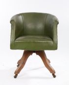 Author Lawrence Meynell's desk chair, the green leather swivel desk chair above four arched legs