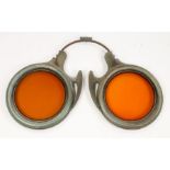 Unusual early 20th Century Opticians trade sign, in the form of a pair of spectacles with orange