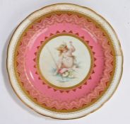 Paris Exhibition interest, a Mintons porcelain plate, decorated with a young lady fishing by a