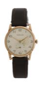 Garrard 9 carat gold gentleman's wristwatch, the signed silver dial with Arabic markers, outer