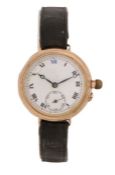 9 carat gold trench watch, the white enamel dial with Roman numerals and subsidiary seconds dial,