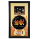 AC/DC, signed drum head, bearing the signatures of Brian Johnson, Malcolm Young, Angus Young,