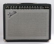 1984 Fender Deluxe Reverb II amplifier, with footswitch.
