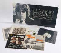 6 x Beatles related singles together with John Lennon - Legend promotional display stand.