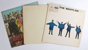 3 x Beatles LPs. Help! (PMC 1255), with later sleeve. The Beatles (PCS 7068), French reissue. side