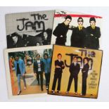 4 x The Jam 7" singles. In The City/Takin' My Love, first press. All around The World/Carnaby Street
