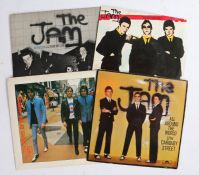 4 x The Jam 7" singles. In The City/Takin' My Love, first press. All around The World/Carnaby Street